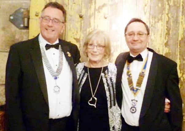 Seahouses and District Rotary Club, Rotarian Sheena Trotter was presented with a Paul Harris Fellowship, Seahouses President John Wilson and District Governor Terry Long.