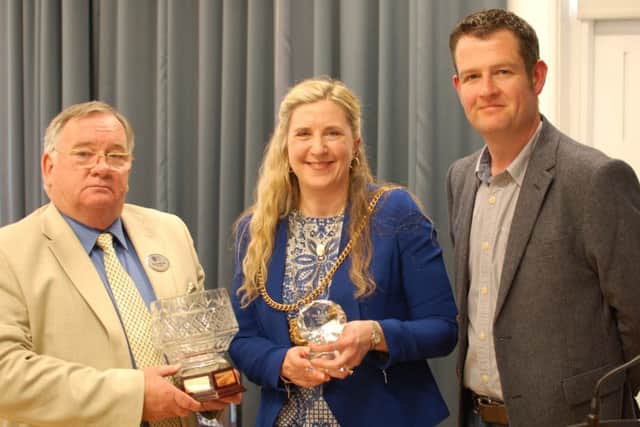 Coun Stuart Lishman, left, accepted the Community Award on behalf of Stobhill Community Link. He is pictured with Morpeth Mayor Alison Byard and Nigel Lawton of Heighley Gate Nursery and Garden Centre. Picture by Bob Robertson.