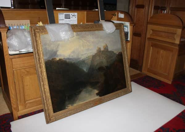 The Turner painting being packed up at Cragside.