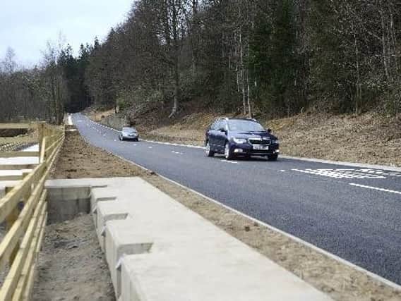 The reopening of the B6344 road from Rothbury near Crag End which closed on Boxing Day 2012 because of a landslip. Picture by Jane Coltman.
