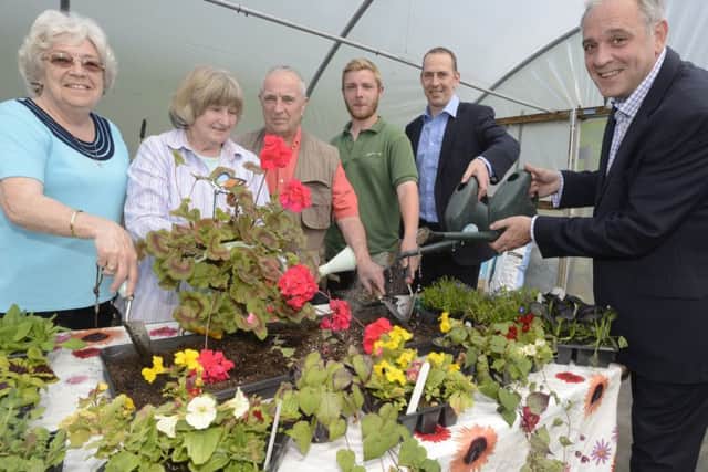 Blooming success: Margaret Conway, Jenny Percival, Tom Dundas, gardener Simon Grimwood, Alnwick Garden director Mark Brassell and Primula UK MD Paul Lewney celebrate their partnership.
Picture by Jane Coltman