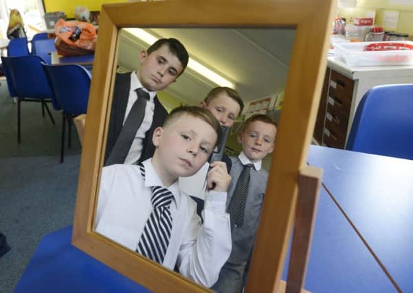 Pupils at Red Row First School get ready for their film premiere. Picture by Jane Coltman