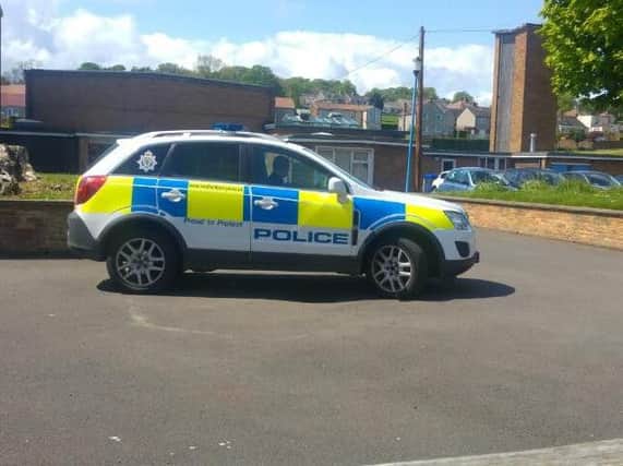 A police car at Alnwick's Lindisfarne Middle School. Picture by Jane Coltman.