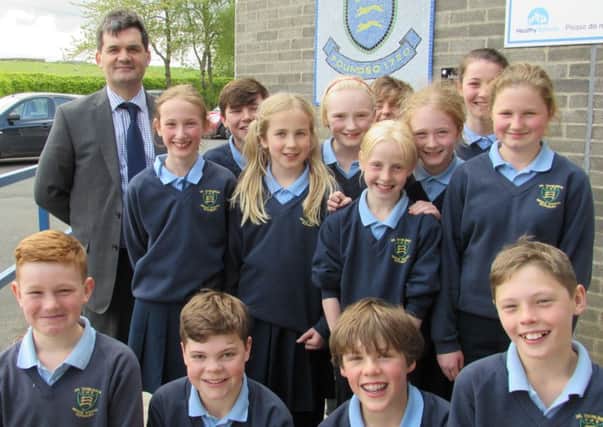 Headteacher Liam Murtagh with pupils at Dr Thomlinson Church of England Middle School in Rothbury.