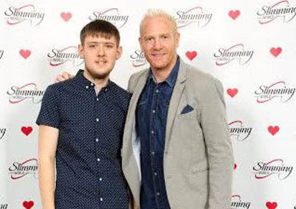 Brian Younger with special guest Iwan Thomas at the Slimming World competition.
