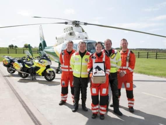GNAAS pilot Phil Lambert, John Quinn, of Blood Bikes Cumbria, Dr Rachel Hawes, Steve Rawlings, of Northumbria Blood Bikes, and GNAAS paramedic Andy Dalton.