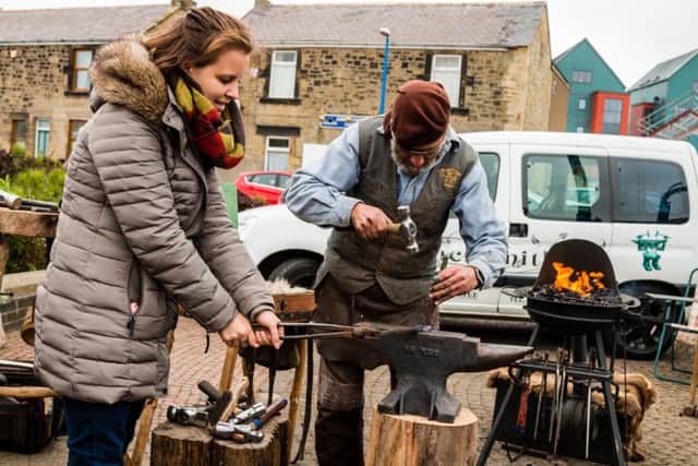 Red Row-based blacksmith Stephen Lunn held interactive workshops. Picture by Andrew Mounsey