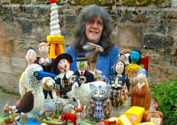 Sue Shaw with some of the felt items she has created.