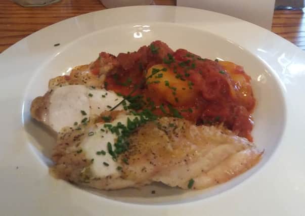 Oven-roast chicken supreme with potato, tomato and chorizo stew