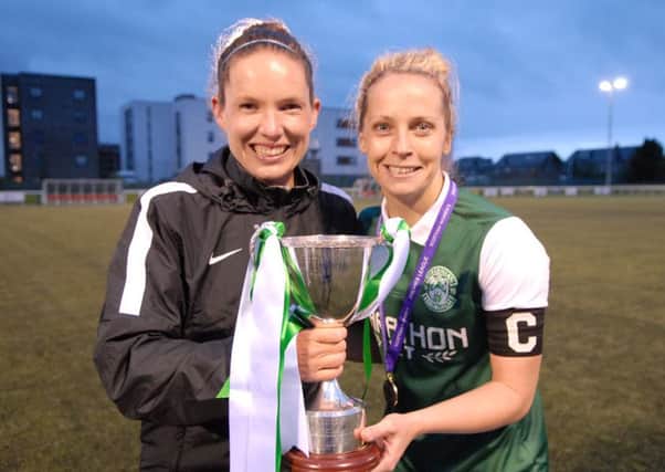Hibernian Ladies Assistant Coach Claire Ditchburn, of Whitley Bay, (left) with team captain Joelle Murray on the pitch after a dramatic injury time goal gave them victory in the Scottish Women's League cup final. Picture by North News & Pictures.