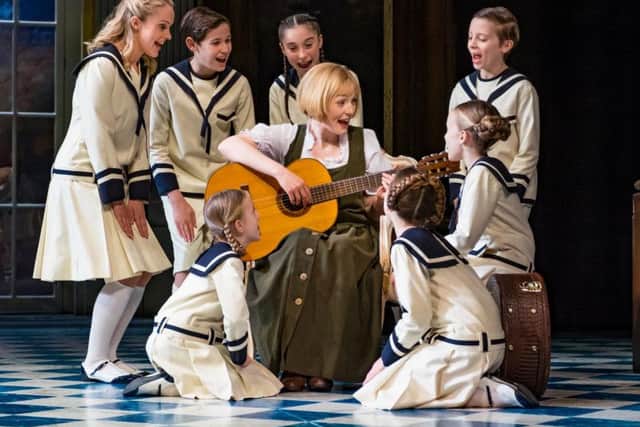 Lucy O'Byrne as Maria and the von Trapp children in the Sound of Music at Sunderland Empire. Picture by Mark Yeoman