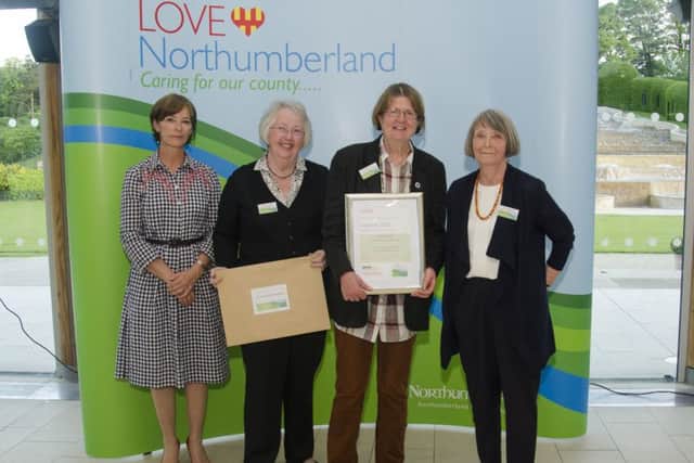 The Friends of Alnmouth Station are presented with their Love Northumberland award by the Duchess of Northumberland.