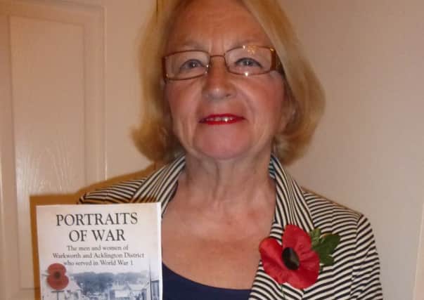 June Watson with her new book.