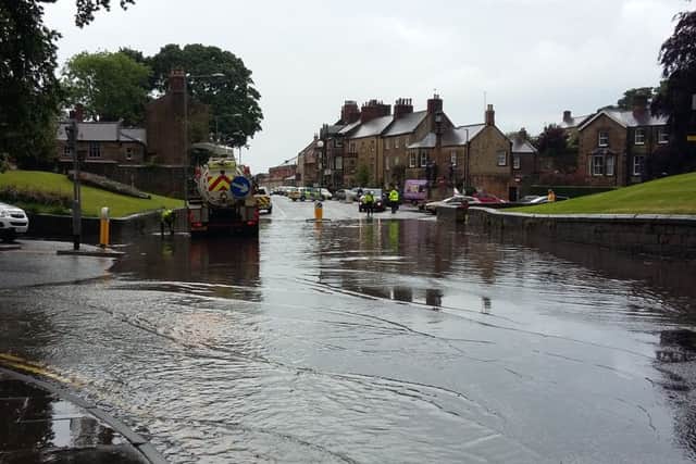 Flooding on Bondgate Within. Picture by James Willoughby