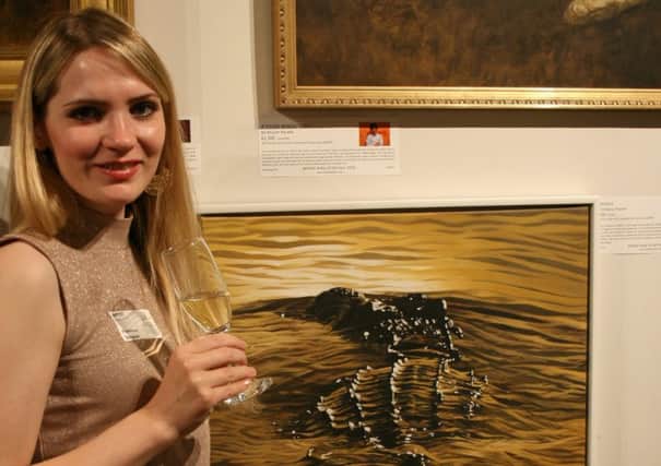 Artist Francesca Simpson with her shortlisted crocodile painting.