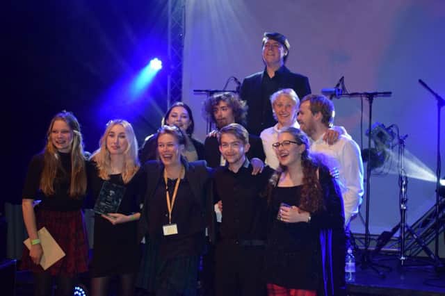 Both bands pictured together, with head of music Susie Cochrane.