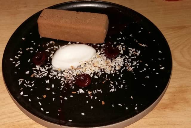 Chocolate, brownie, mousse, soil with frozen raspberry textures (Â£6.95).