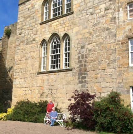 Fiona and John Craster outside Craster Tower Penthouse Apartment.