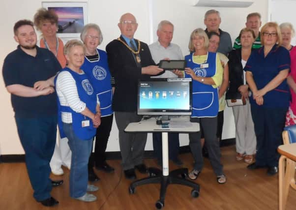 Members of the League of Friends are pictured with Sam Parks, hospital apprentice; Jennifer Dalton, volunteer;  the Mayor of Alnwick Alan Symmonds; Charles Smith, Butler Ember Trust Warkworth; Malcolm and Pam Kus and Mary Castleton, Blink Bonny quiz team;  Anna Wood, Modern Matron; and Brenda Longstaff, Bright Charity.