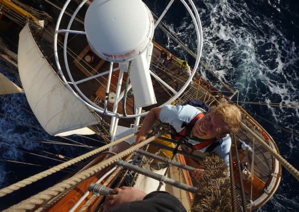A volunteer climbs the mast on the Bark Europa Eu exchange 2012.