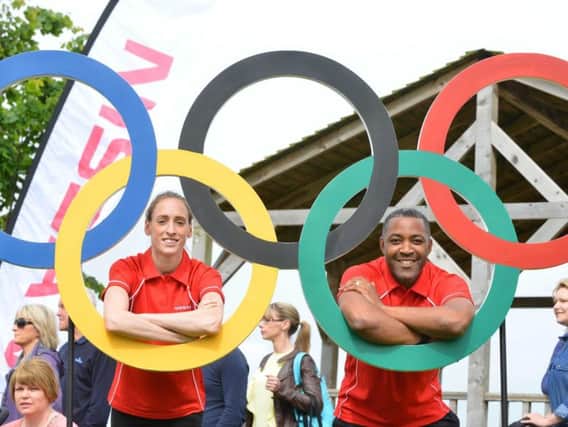 Olympic athlete Laura Weightman and Team GB legend Darren Campbell at the Nissan Olympic-themed games at Newbottle Primary Academy.