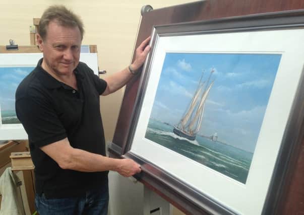 Edwin Blackburn with his painting of the Williams II Tall Ship.