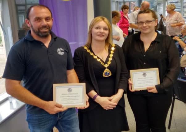 Amble Mayor Jane Dargue (centre) with a representative from Amble Coastal Rowing Club (left) and Amble Detachment of the Northumbria Army Cadets (right).