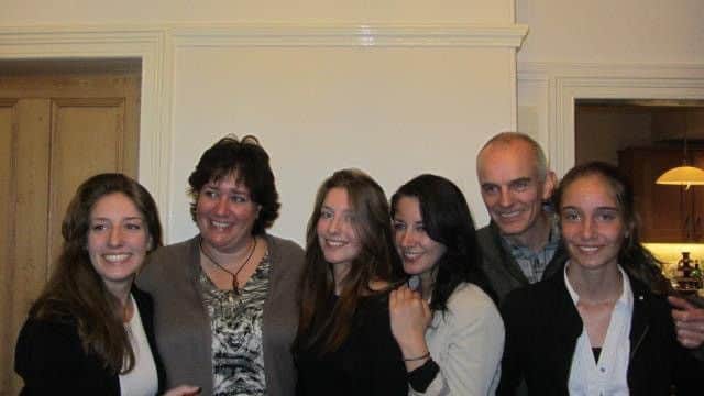 Sally Wood with husband Richard and their four daughters.