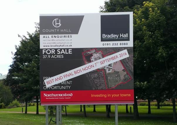 One of the County Hall for sale signs with the addition of the deadline for best and final bids.