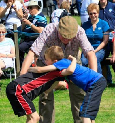 Getting to grips with the Cumberland and Westmorland wrestling.