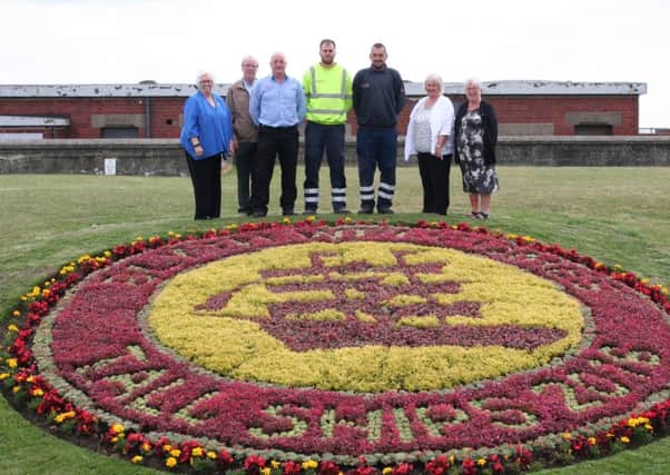 (left-right ): Councillors Val Tyler and Gordon Webb, gardeners: Tom Crate (in hi-viz) Dale Charlton (dark blue shirt), Jimmy Reith (light blue shirt) and councillors Eileen Cartie and Kath Nisbet.