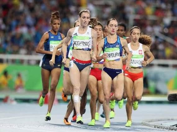 Laura Weightman (white vest) at the front of the pack in the early part of the 1500m final. She ran with a dressing on her right shin after picking up a spike injury in the semi-final, which required five stitches.