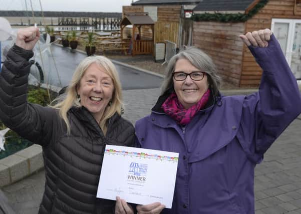 Julia Aston and Ann Burke with the High Street Award.
Picture by Jane Coltman