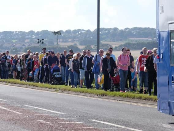 Queues for the park and ride at the south car park yesterday.