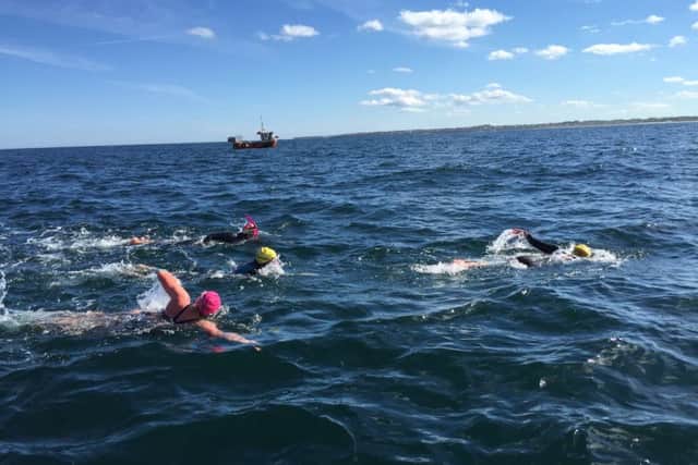 The team during the swim from the Farne Islands to Bamburgh.