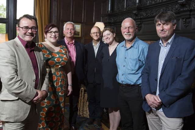 Simon Armitage, right, with Northumberland National Park representatives and chief executive Tony Gates at the Poems in the Air launch at Haughton Castle. Picture by Mark Savage