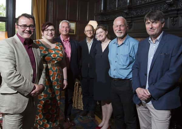 Simon Armitage, right, with Northumberland National Park representatives and chief executive Tony Gates at the Poems in the Air launch at Haughton Castle. Picture by Mark Savage