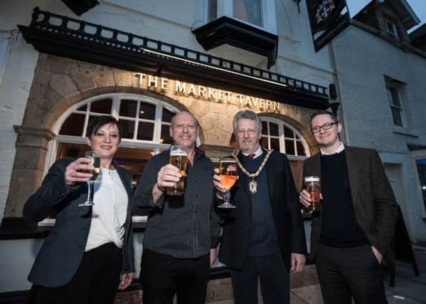 From left: Rebecca Davies, new business development manager for Punch; Chris Hume, publican of the newly-refurbished Tavern Steakhouse and Lodge, Fenkle Street, Alnwick; Mayor of Alnwick Bill Grisdale; and Simon Lynch, partner development manager for Punch.