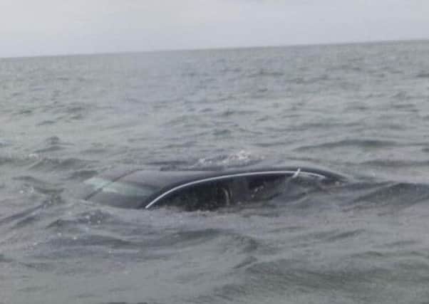 The car after the two people had been rescued by Seahouses RNLI.