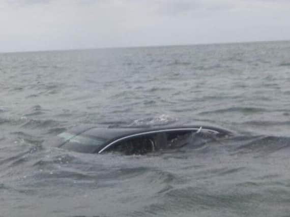 A car after the two people had been rescued by Seahouses RNLI.