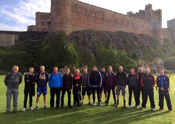 Those taking part in the Wicket to Wicket Coastal Walk at the start in Bamburgh.
