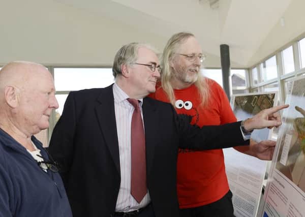 Residents Dicky Purvis and Martin Horn with Paul Bigg, of SAJ Transport Consultants, at the exhibition showing proposals for 500 new homes in Amble.
Picture by Jane Coltman