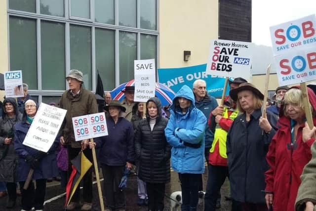 Campaigners braved the rain this afternoon to show the strength of feeling against the temporary closure.
