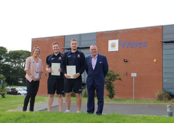 Newly-employed leisure assistants Callum Davidson (middle-left) and Jake Greener (middle-right), with Paul Youlden, senior manager for sport and leisure, and Kimberly Pye, manager of Waves.
