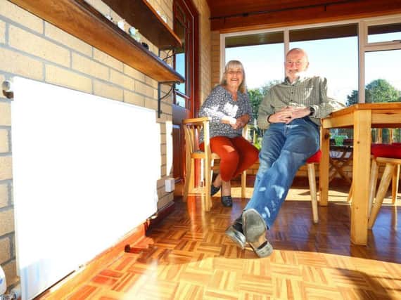 Mr and Mrs Octon are one of more than 700 families to receive a free central heating system.