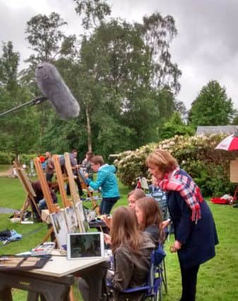 The triplets during the filming for Sky Arts' Landscape Artist of the Year.