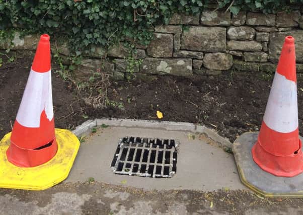 The new drain outside of the church.