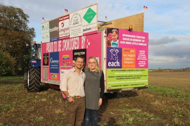 Alyson and Neil Clark, from Stonea in Cambridgeshire, who travelled 990 miles from Land's End to John OGroats on a tractor towing a pink trailer.
