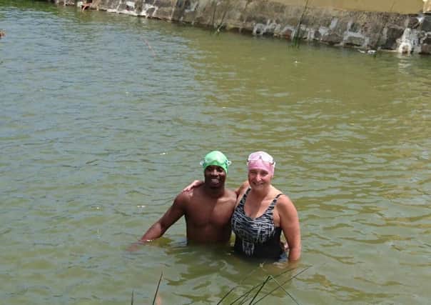 Jane Hardy and Arafat Gatabazi in the moat of the Castle of Good Hope, in South Africa.