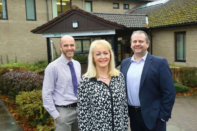 Dr Graham Syers, patient Teresa Dixon and practice manager Tony Brown outside The Bondgate Practice in Alnwick which has introduced a new appointment system.